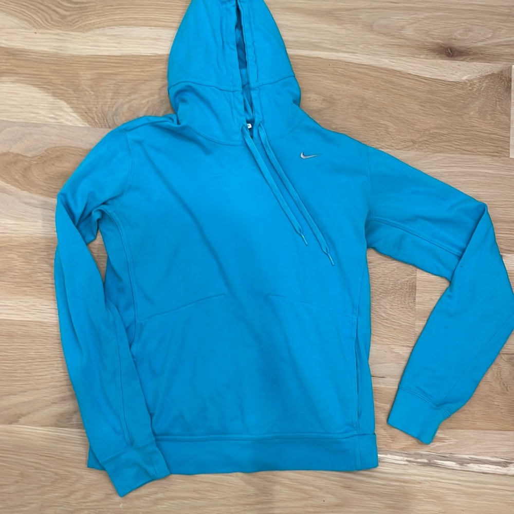 More teal than pictured Nike pullover